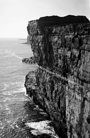 CLIFFS RISING FROM THE SEA